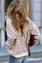 Model wearing khaki animal print cardigan with relaxed silhouette