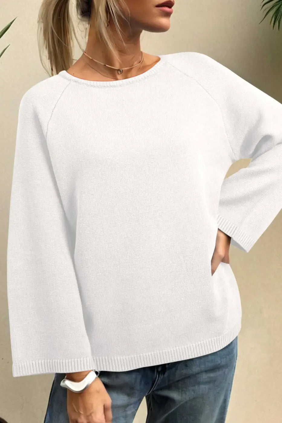 White Bell Sleeve Loose Knit Jumper with wide sleeves and relaxed cut, styled for a minimalist fall fashion look.