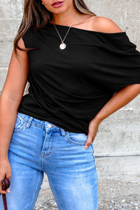 Woman wearing asymmetric neck short sleeve plus size blouse