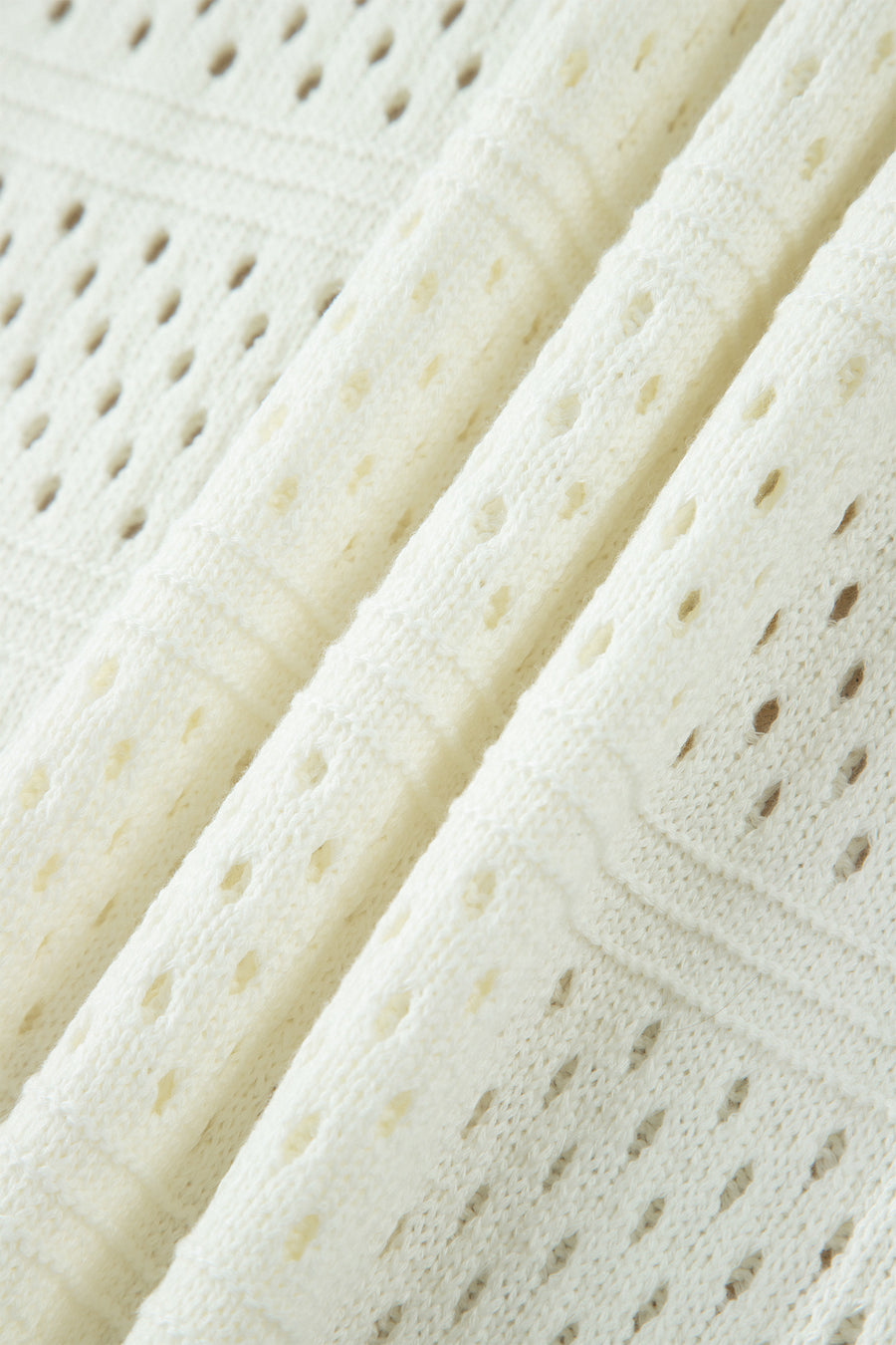 Plus Size Eyelet Hollow Out Knit Short Sleeve Sweater Ribbed Trim White — angled view | Fashionfitz UK