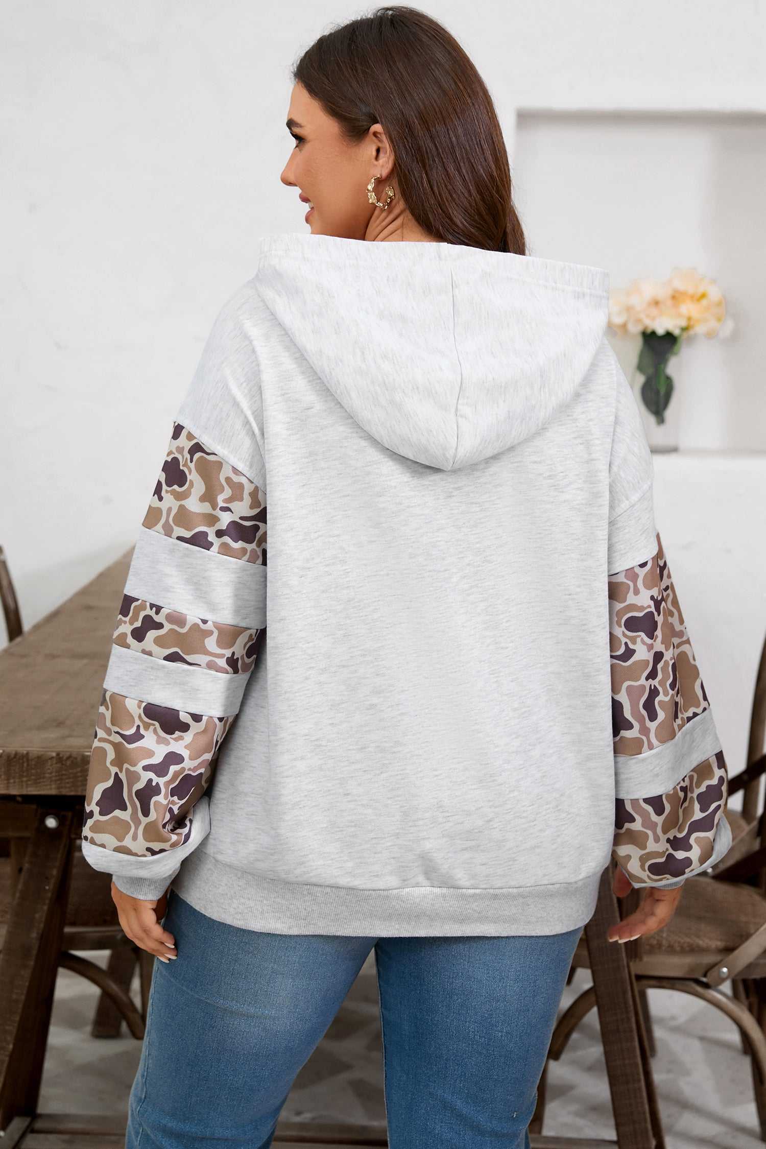 Back view of Curve Light Grey Camo Panel Hoodie for Women showing camo print sleeves and relaxed fit, ideal for fall casual wear.