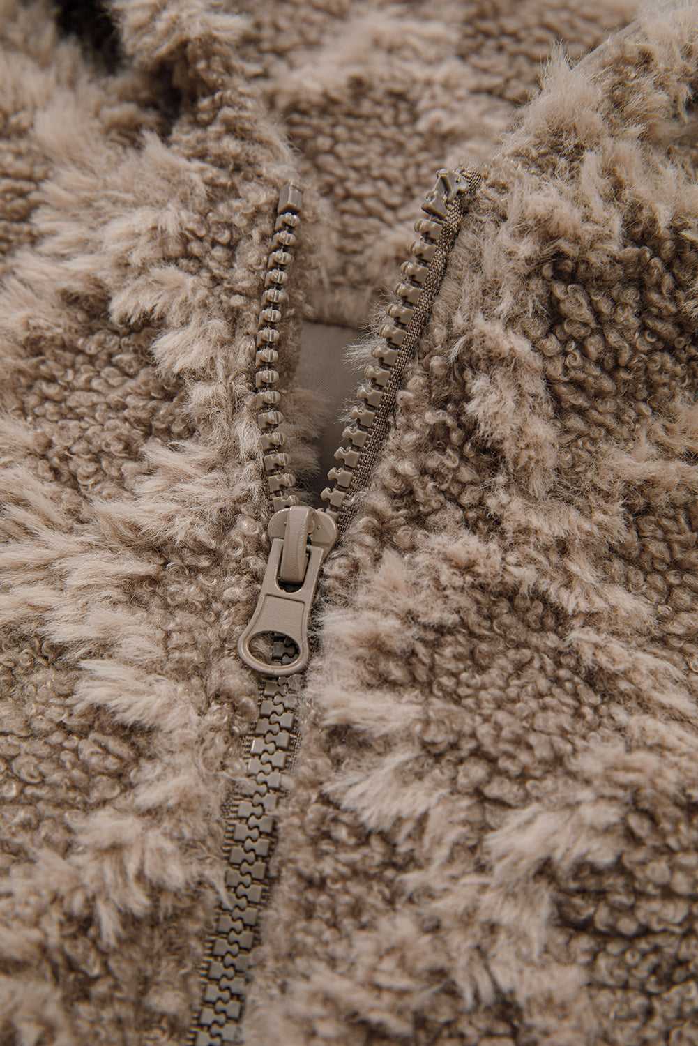 Close-up of zipper detail on Camel Sherpa Fleece Jacket showing durable zip and plush fleece texture, perfect for cold-weather outerwear.