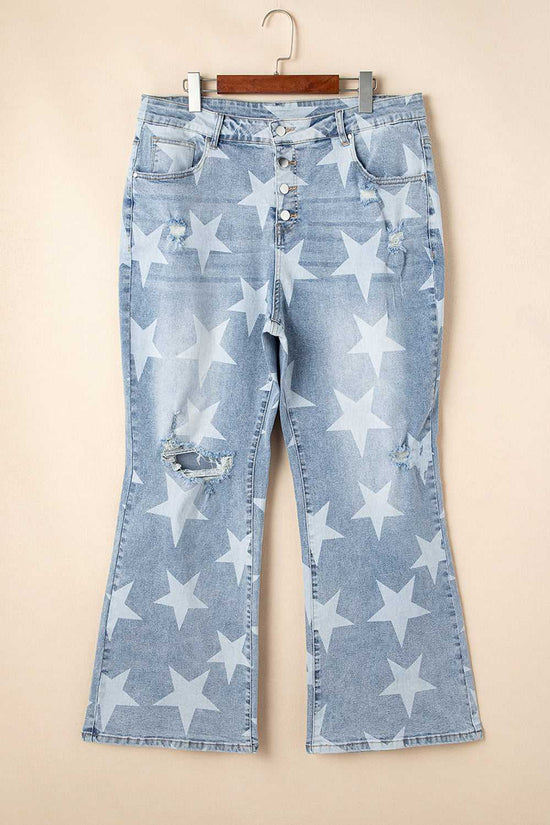 Flat lay of blue distressed plus size jeans with white star print and wide-leg cut, ideal for casual summer fashion collections.
