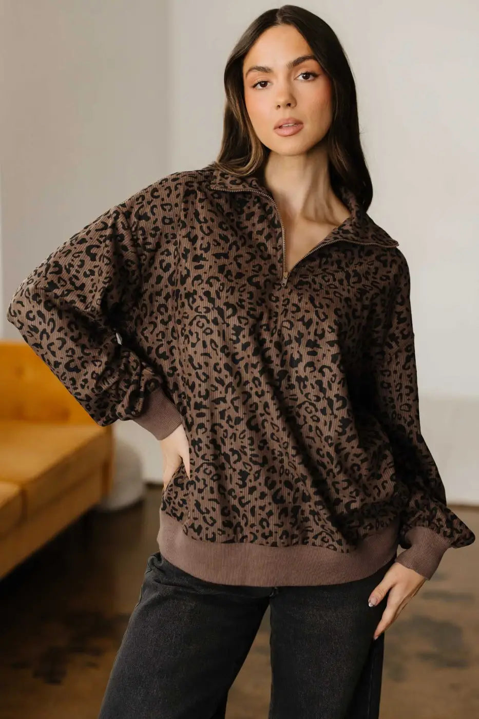 Front pose of model in Women's Brown Leopard Print Corduroy Half-Zip Jumper, ideal for cozy fall and winter outfits.