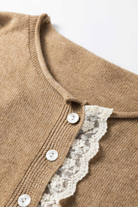 Close-up of Taupe Lace Trim Loose Cardigan showing white lace detail and ribbed button placket. Feminine and soft knitwear texture.