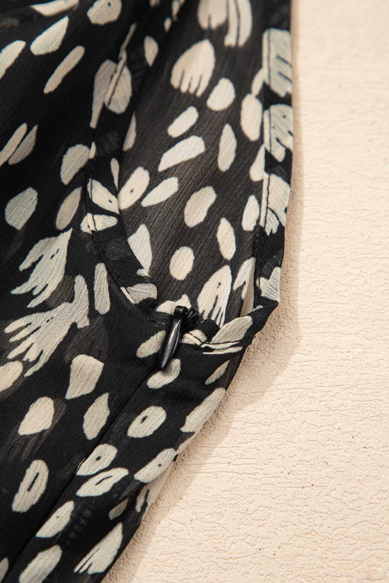 Side zipper detail on Black Floral Sleeveless Maxi Dress for easy wear and secure fit, ideal for casual or occasion summer wear.