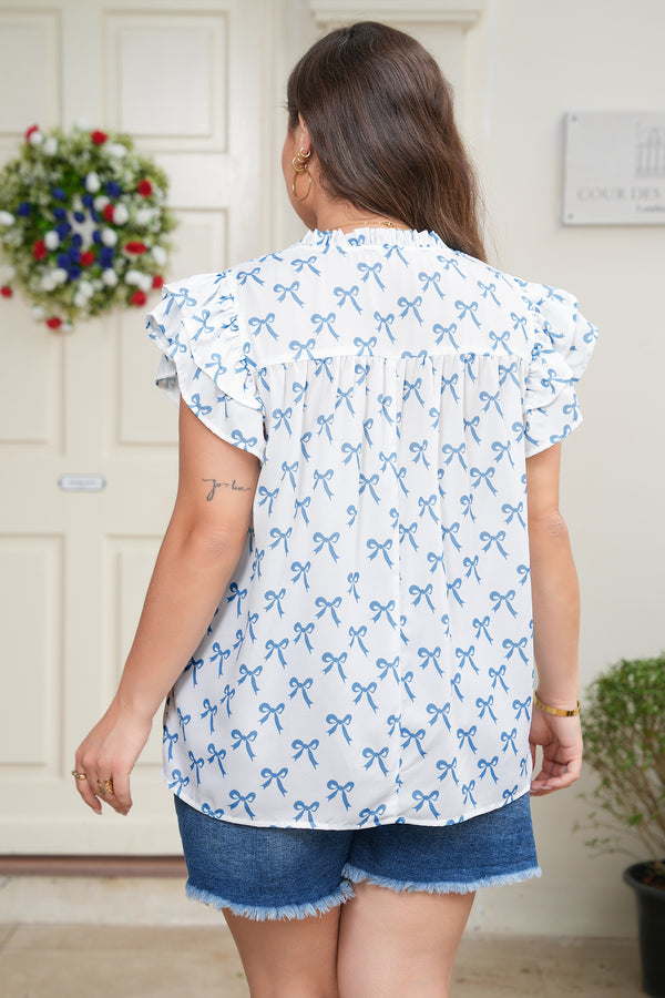Back view of ruffled bow plus size top showing short sleeve detail