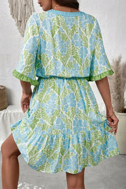 Sky blue A-line floral mini dress showing ruffle chest and sleeve detail, side view, Fashionfitz