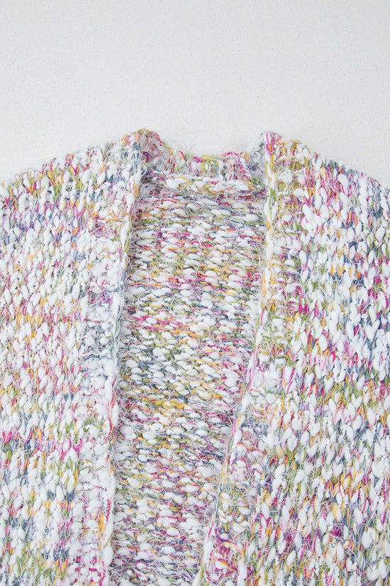 Close-up of white confetti knit cardigan for women, showcasing multicolor yarns in open front duster style. Ideal for fall layering.