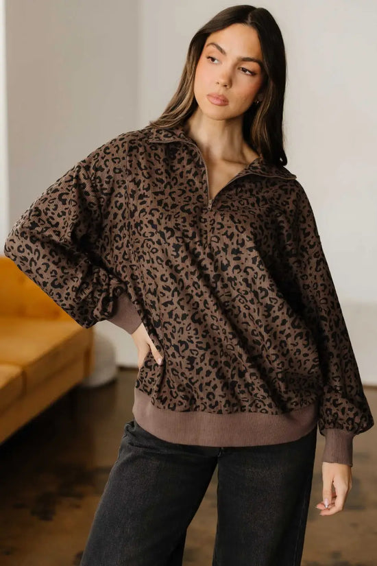 Model standing in Women's Brown Leopard Print Corduroy Half-Zip Jumper, styled for casual western-inspired fashion.