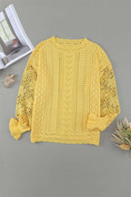 Flat lay of Yellow Crochet Lace Pointelle Knit Sweater on gray background, displaying full front design and intricate lace sleeve details.
