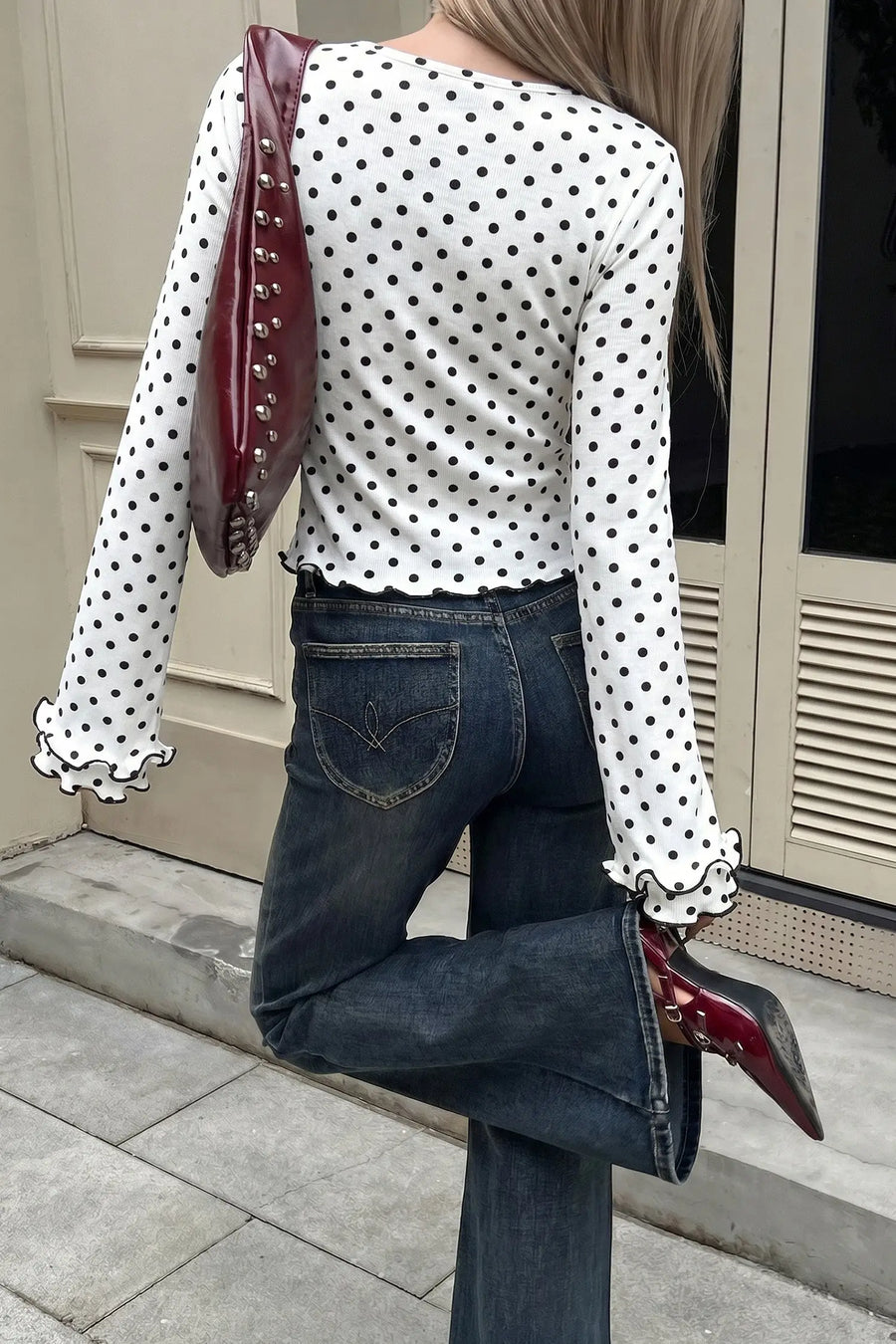 Black Polka Dot Print Lettuce Trim Long Sleeve Top — close-up detail | Fashionfitz UK