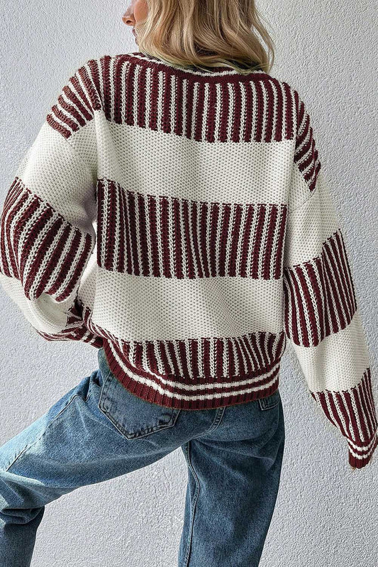 Two-tone brown knit jumper styled with jeans 