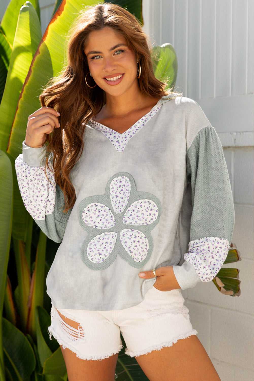 Floral Applique Oversize Hoodie in pear-green waffle knit with V-neck and patchwork flower design, styled for fall fashion in women’s casual wear.