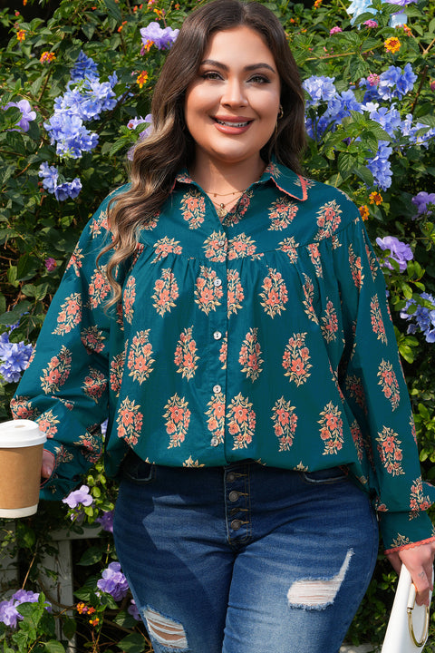 Woman wearing floral print contrast lacy trim pleated loose plus size shirt