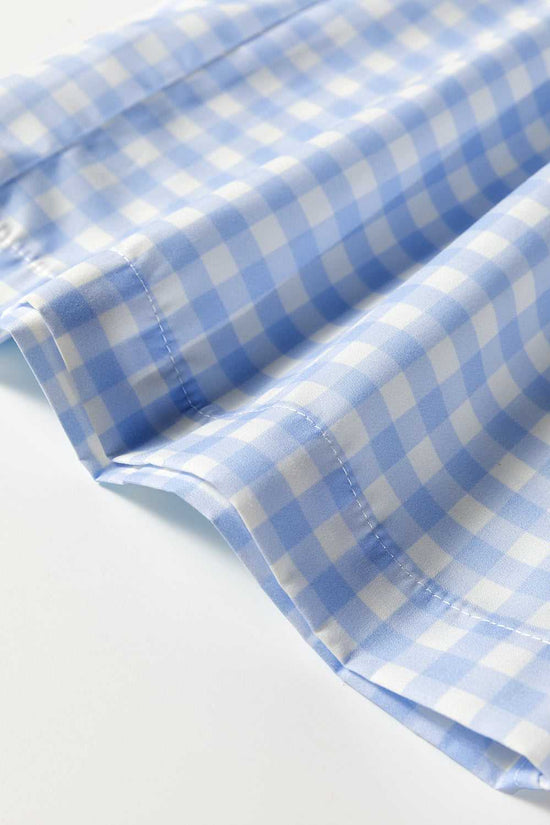 Side seam and hem detail on relaxed fit trousers