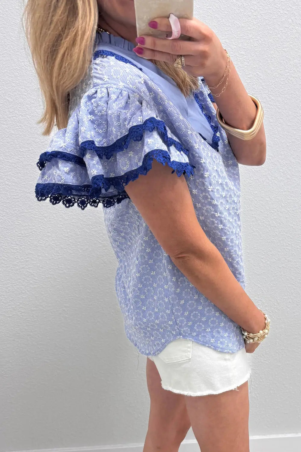 Eyelet embroidered flutter sleeve blouse with lace trim blouses