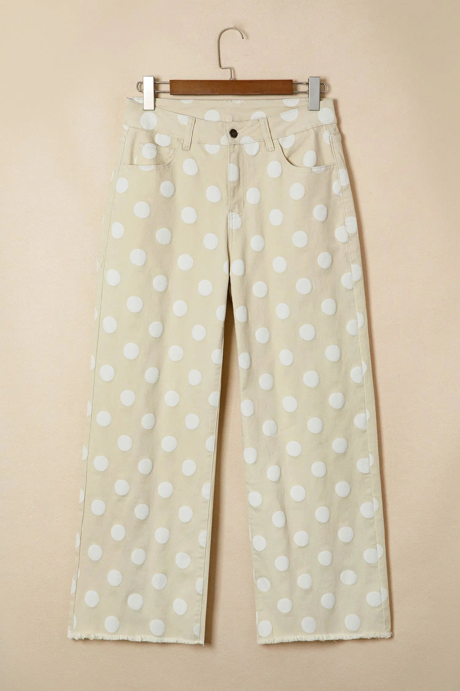 Flat lay of sky blue polka dot raw hem straight jeans showing full length and print detail Fashionfitz UK