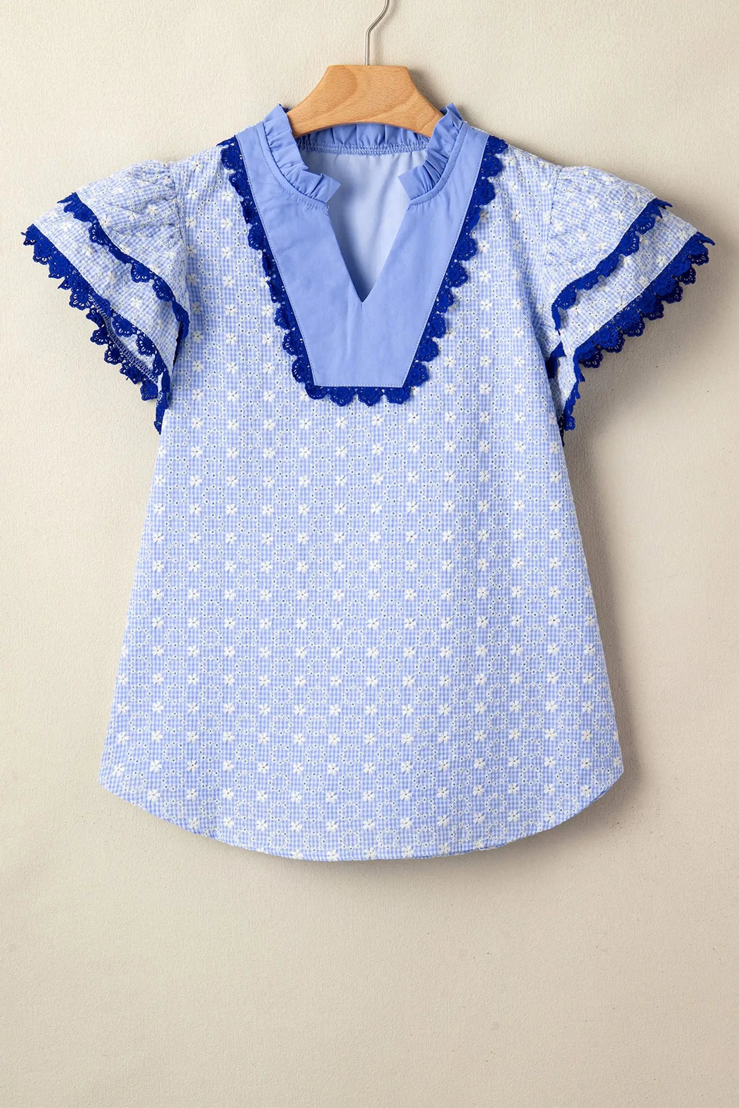 Eyelet embroidered flutter sleeve blouse with lace trim blouses