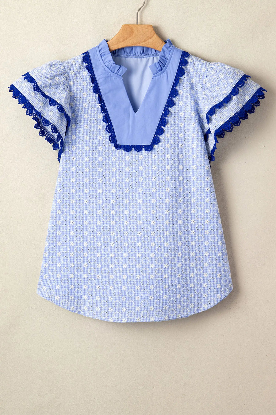 Eyelet embroidered flutter sleeve blouse with lace trim blouses