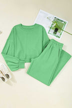 Flat lay of green Drop Crop Wide-Leg Pants Set with accessories, ideal for showcasing casual outfit styling inspiration.