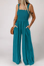 Peacock blue smocked square neck sleeveless jumpsuit with pockets