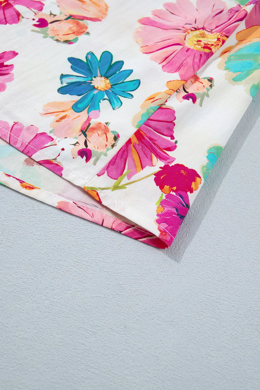Puff sleeve floral V-neck blouse — styled with denim shorts for summer look