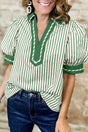 Woman wearing green stripe bubble sleeve collared blouse with split neck front view Fashionfitz UK