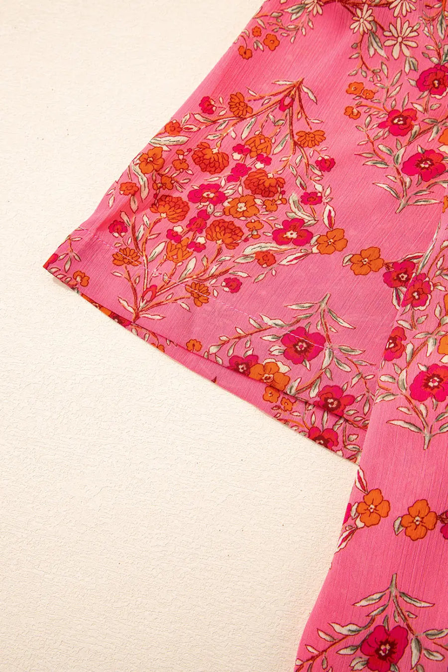 Close-up of Floral Loose Shirt showing shirt collar and button-front detail on rose red floral polyester fabric — Fashionfitz