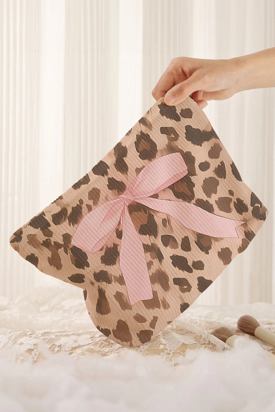 Women's leopard bow makeup bag side view casual