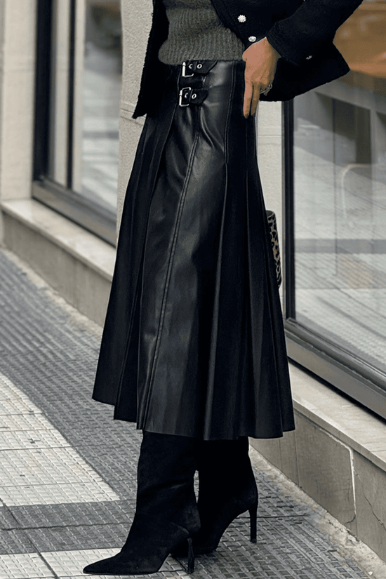 Black Faux Leather Pleated Flared Skirt | FashionFitz side view highlighting the flared silhouette and structured pleats for a modern fall look.