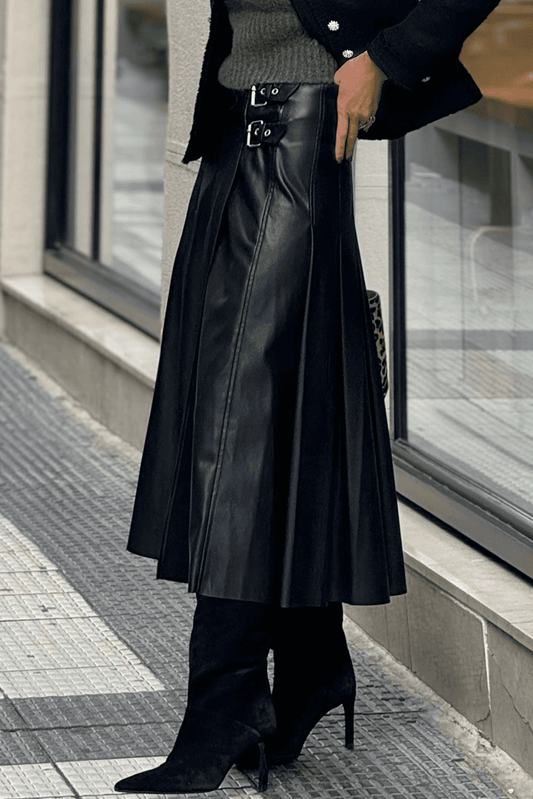 Black Faux Leather Pleated Flared Skirt | FashionFitz side view highlighting the flared silhouette and structured pleats for a modern fall look.