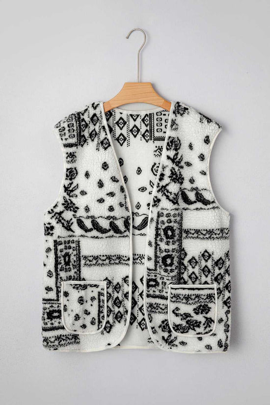 Paisley Sherpa Gilet – Beige Western Style Vest displayed on hanger, featuring fleece fabric and black paisley print for fall layering.