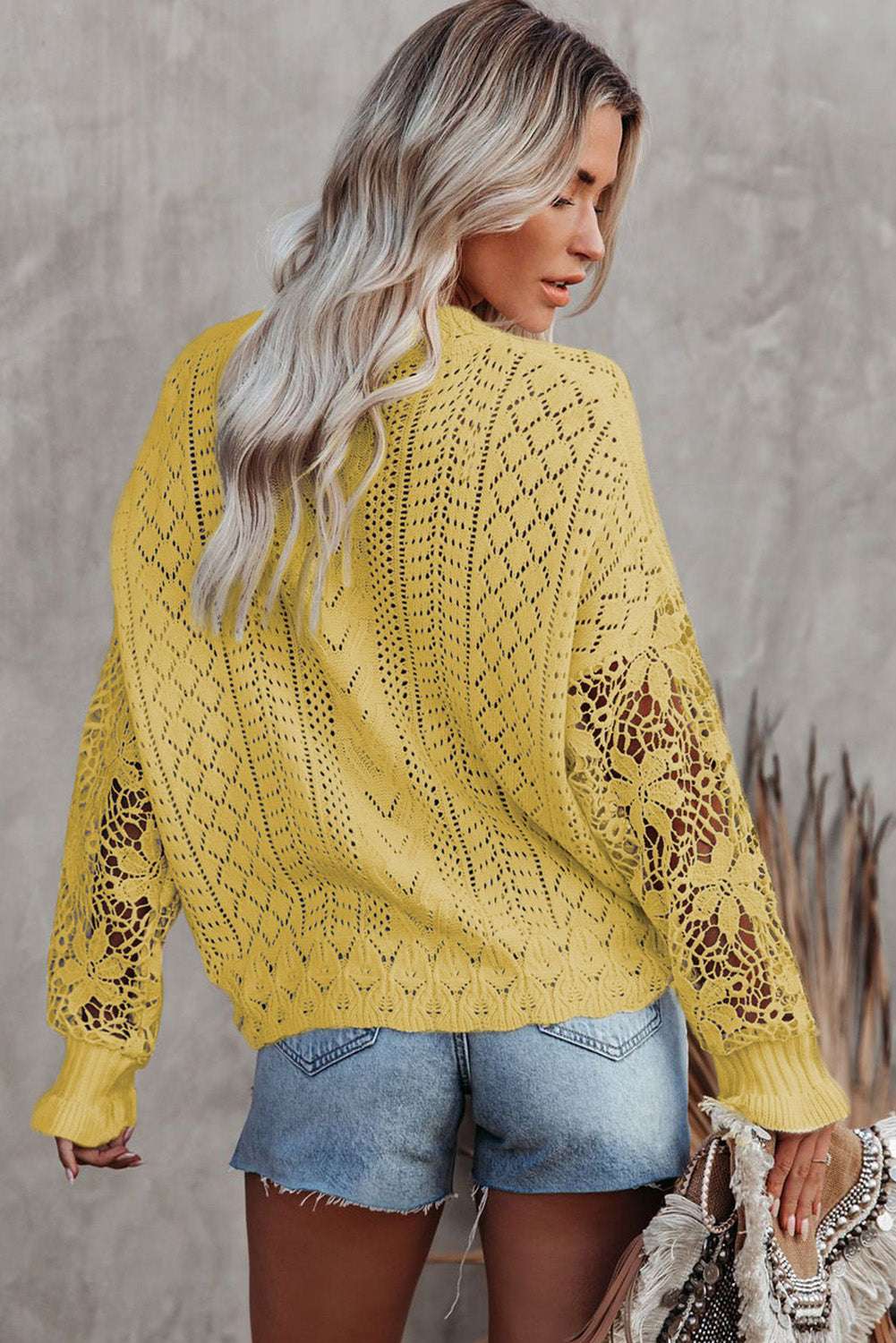 Back view of Yellow Crochet Lace Pointelle Knit Sweater showing detailed lacework and lightweight knit ideal for casual spring outfits.