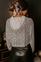 Sparkly hoodie in apricot styled for night out layering
