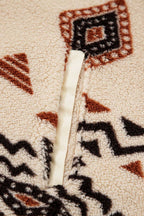 Black Aztec sherpa pullover styled for winter layering