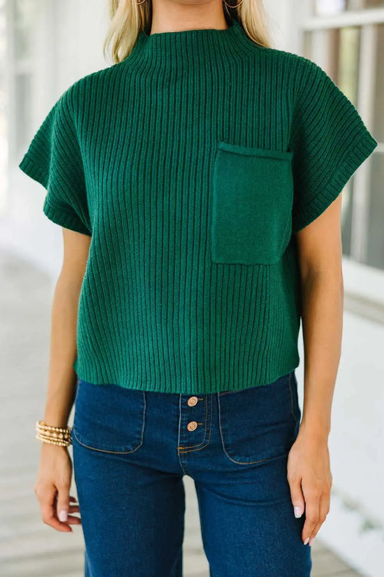 Green Ribbed Knit Short Sleeve Sweater paired with wide-leg jeans and white boots, ideal for casual fall fashion.