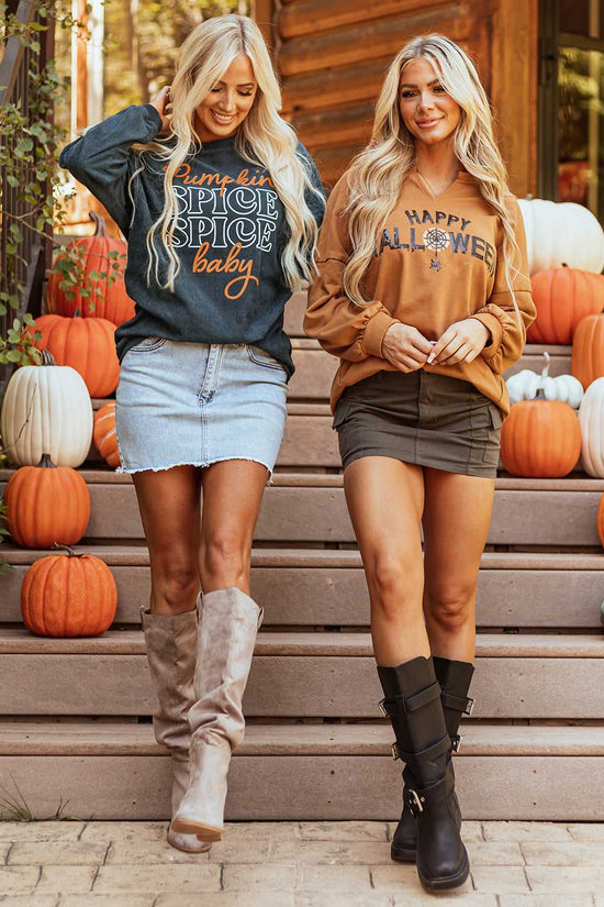 Two women wearing Halloween graphic tops, including chestnut sequin V-neck and navy pumpkin spice sweatshirt, styled with boots and skirts.