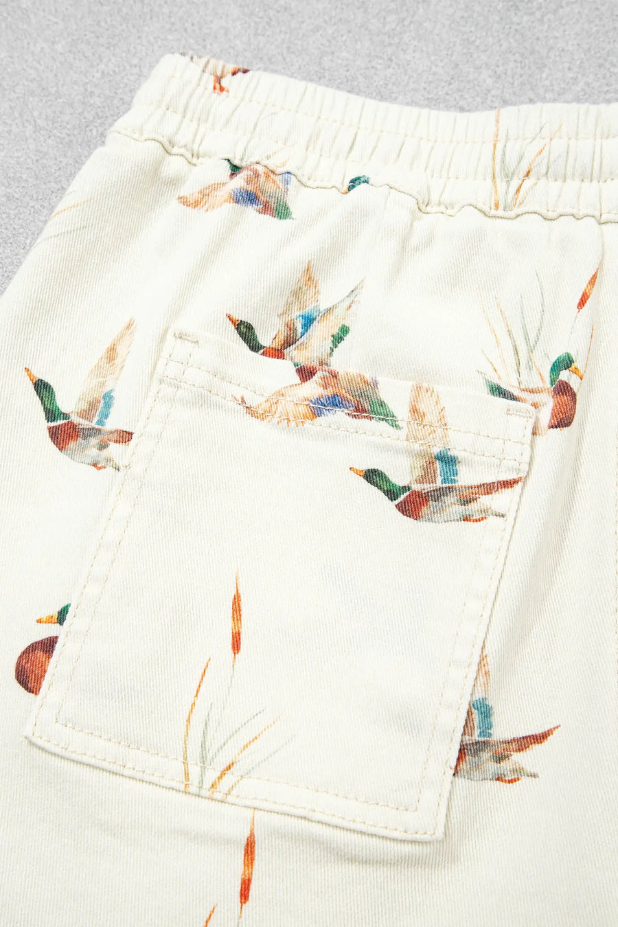 Women's duck print drawstring denim shorts close-up