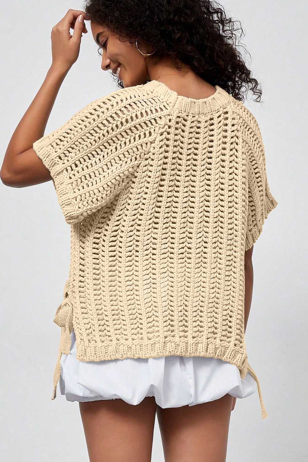 Back view of beige Plus Size Bow Tie Open‑Knit Jumper for Women highlighting relaxed fit and breathable summer knit.