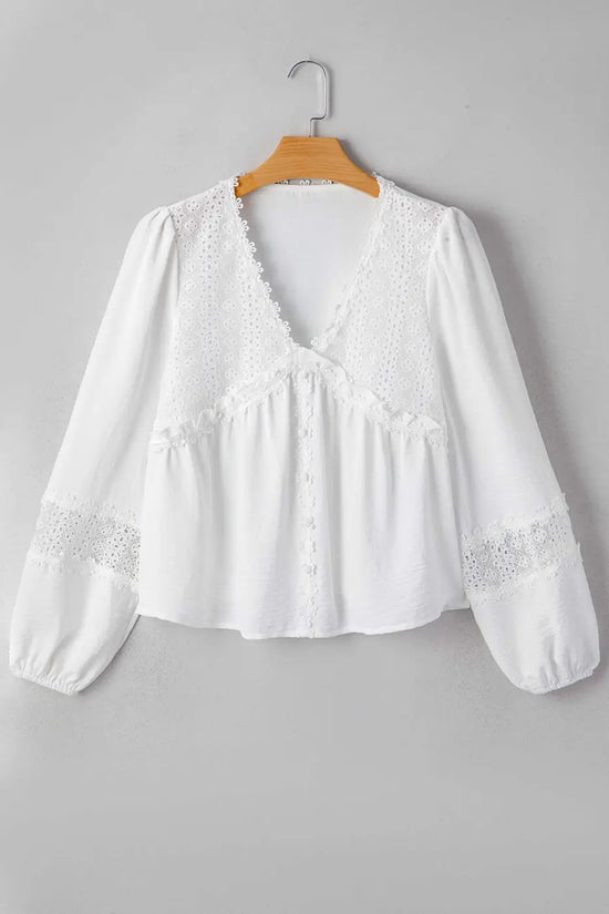 White Guipure Lace Frill Blouse on hanger showing full front view with V-neck, lace accents, and long frill sleeves for a romantic style.