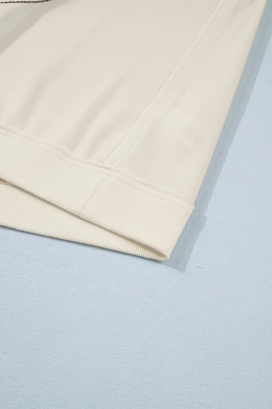 Star trim loose tank top — embroidery texture close-up, western style