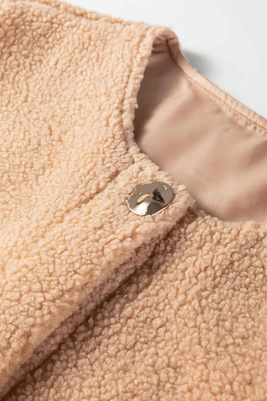Ladies beige fuzzy fleece gilet with big button accent vests