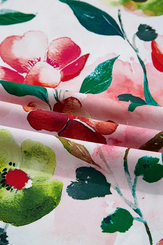 Detailed fabric view of Floral Shift Dress - Casual Elegance, highlighting vivid watercolor floral print and soft summer texture.