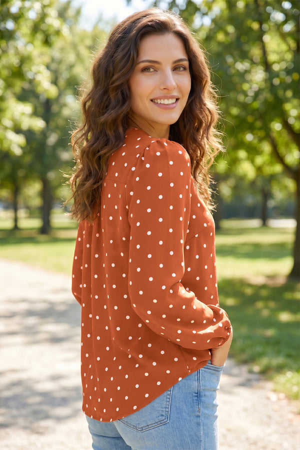 Polka dot long sleeve blouse — half button neckline close-up, side view