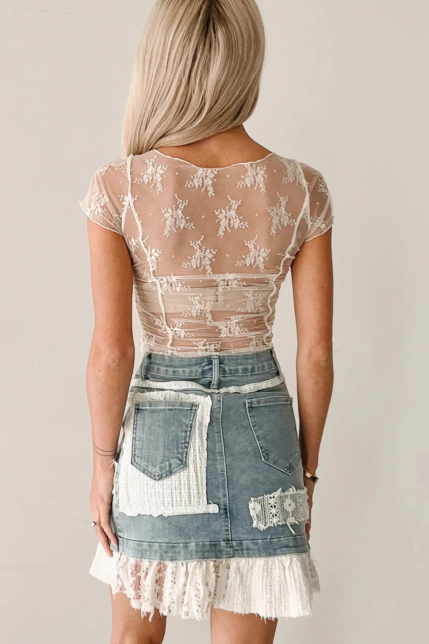 Ruched front panelling close-up on white floral lace mesh top | Fashionfitz UK