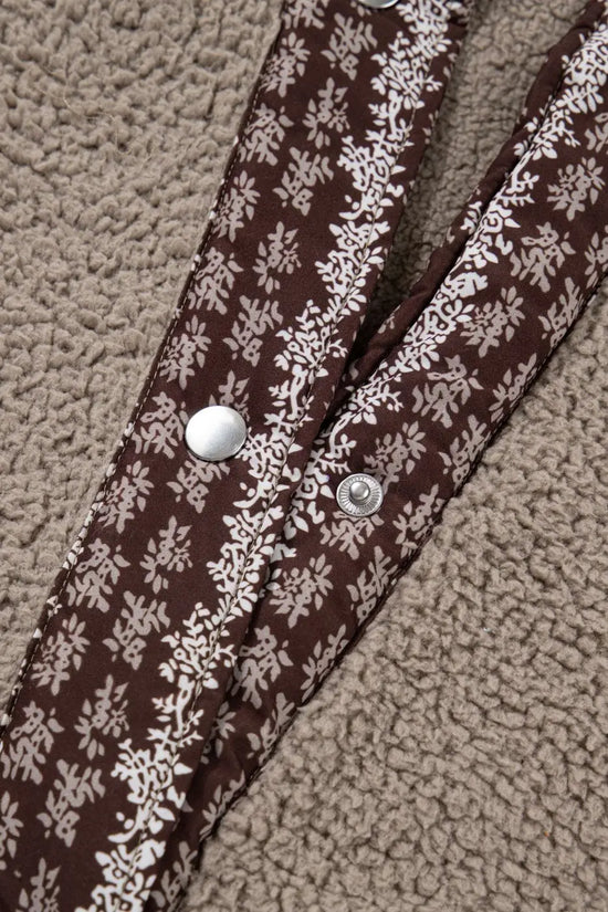 Detailed view of snap button closure and floral trim on Women's Country Borg Fleece Gilet Winter Vest FashionFitz in khaki fleece.