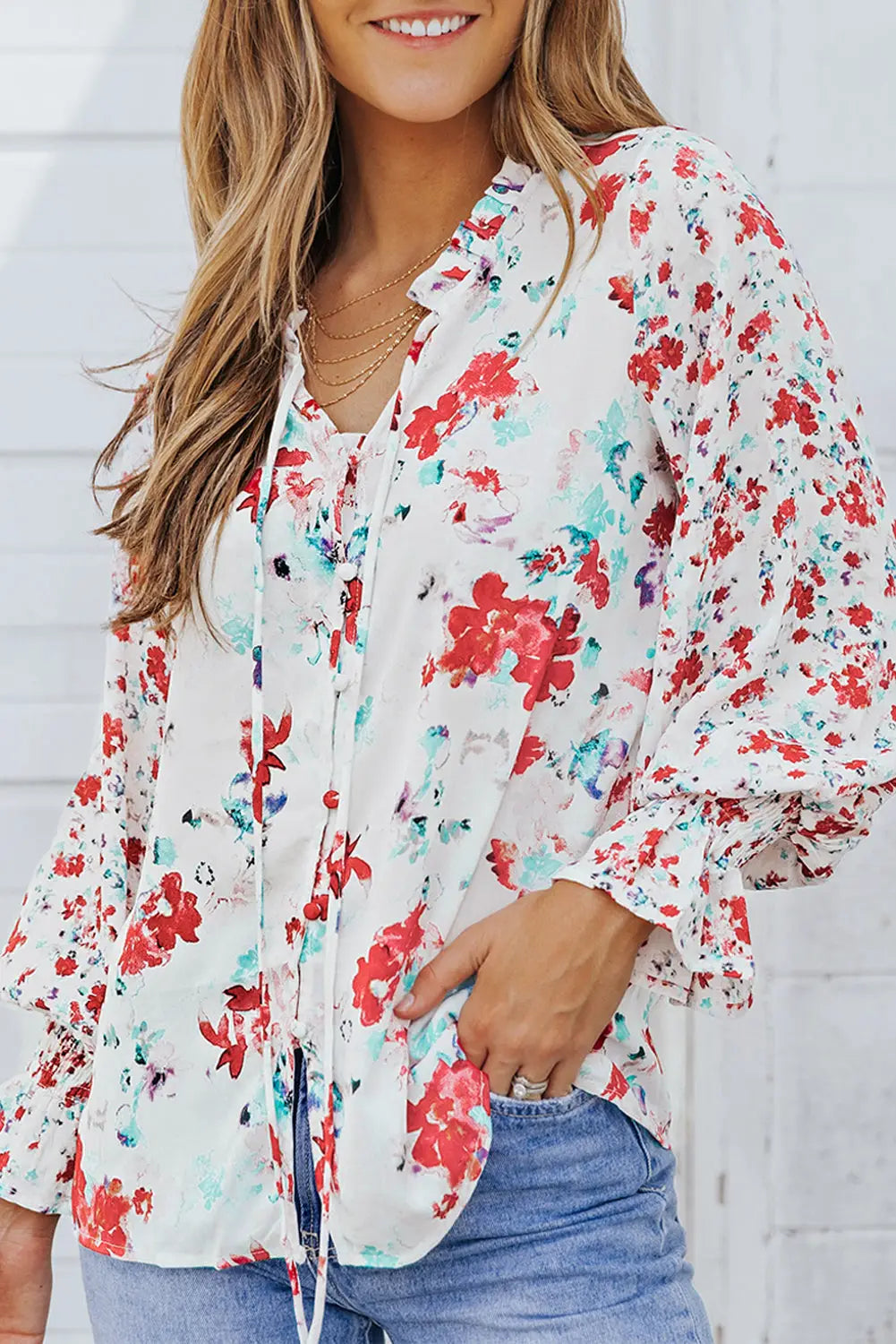 Casual cakewalk floral smocked blouse with ruffles