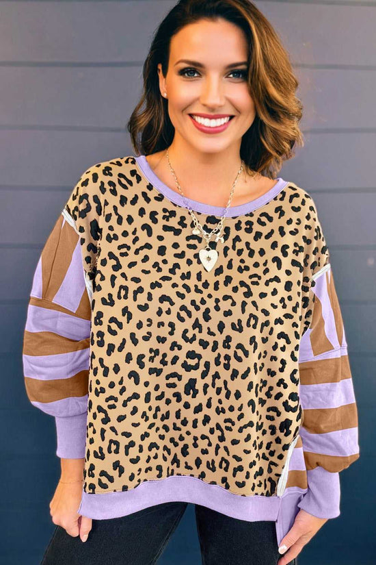 Front view of Curve Leopard Stripe Baggy Sweatshirt in lavender, featuring relaxed fit and color-blocked striped sleeves for trendy fall looks.