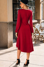 Back view of the Red Long Sleeve Drape Midi Dress showing its elegant flow and relaxed fit, ideal for autumn outings.